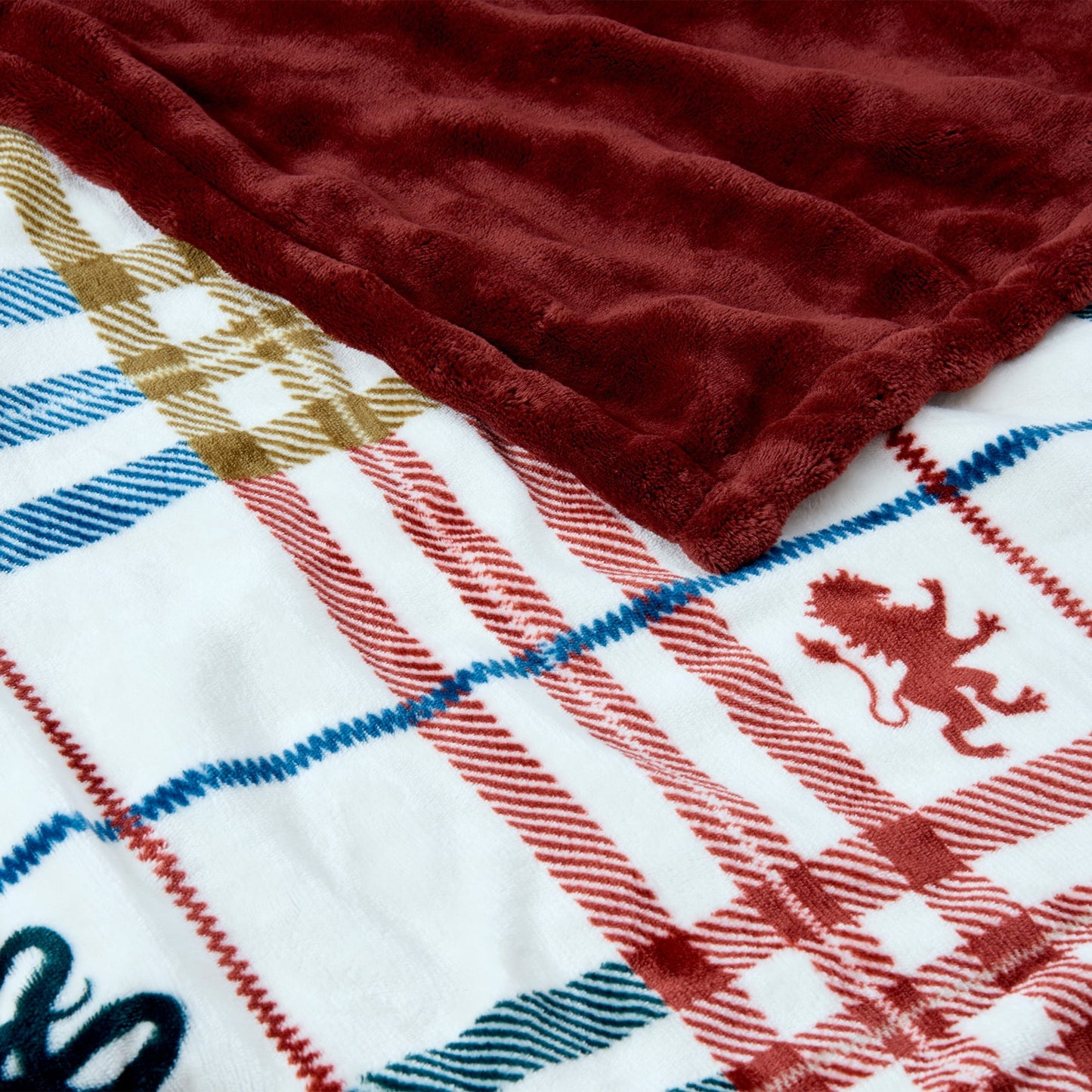 Decorative Knitted Academic Plaid Tartan Crest with Faux Leather Patch and Milky Mink Reverse Throw, 60x70 inches - Super Soft Reversible Sherpa Flannel Blanket Detail
